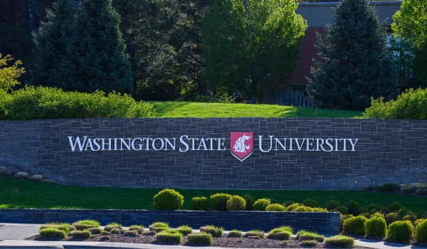 Washington State University sign and logo at entrance to Pullman Washington campus