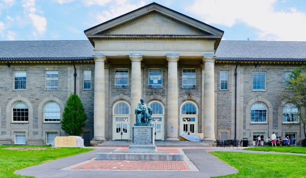 Andrew Dickson White statue and Goldwin Smith Hall of Cornell University in Cornell University’s campus