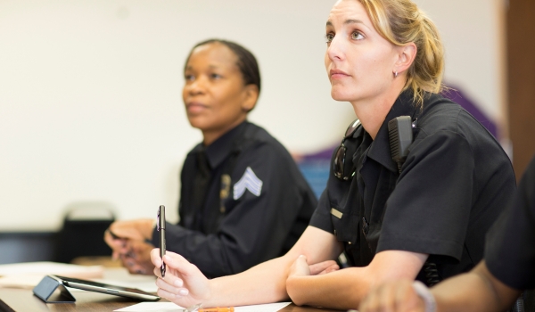 Policewomen in classroom