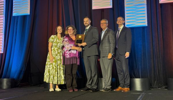 Group of happy multiethnic high school, college or university students having fun on graduation day