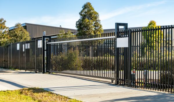 Metal gate in front of facility